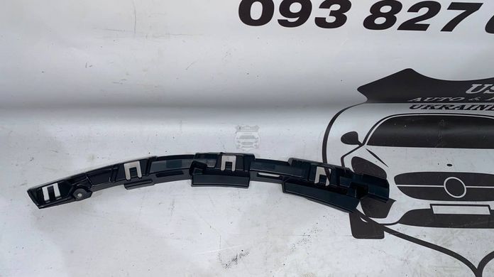 L876695 TESLA MODEL 3 Кронштейн кріплення фари RH(ліцензія) 2023-25